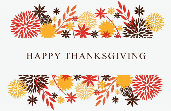 Photo of an autumn accented sign that reads 'Happy Thanksgiving'