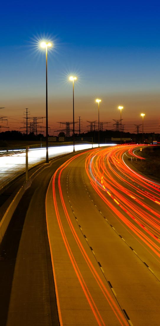 Photo of traffic in a road with a slow shutter speed.