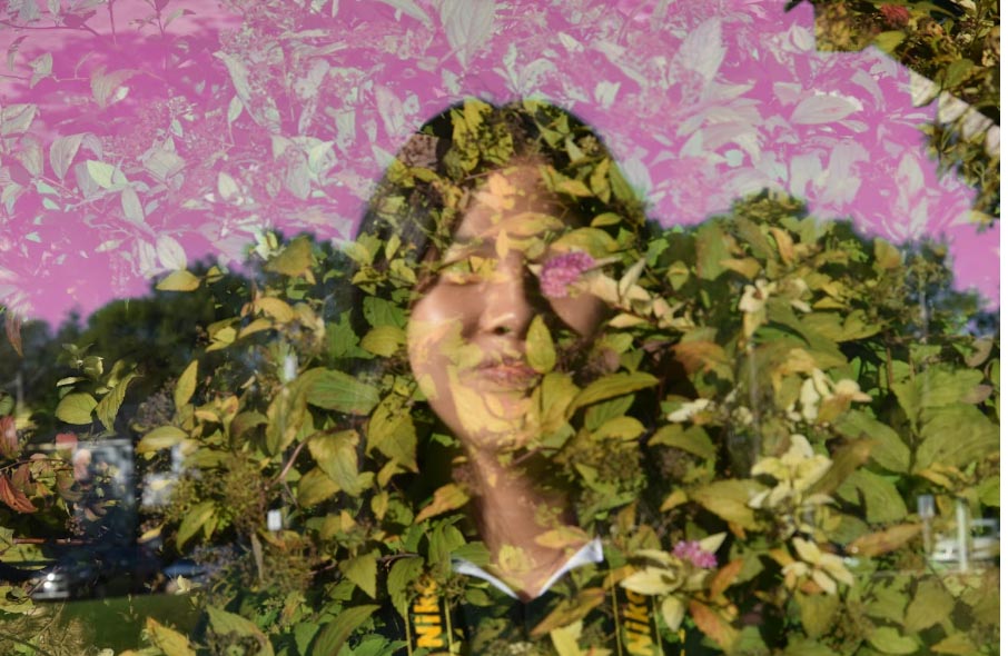 Girl's face with leaves.