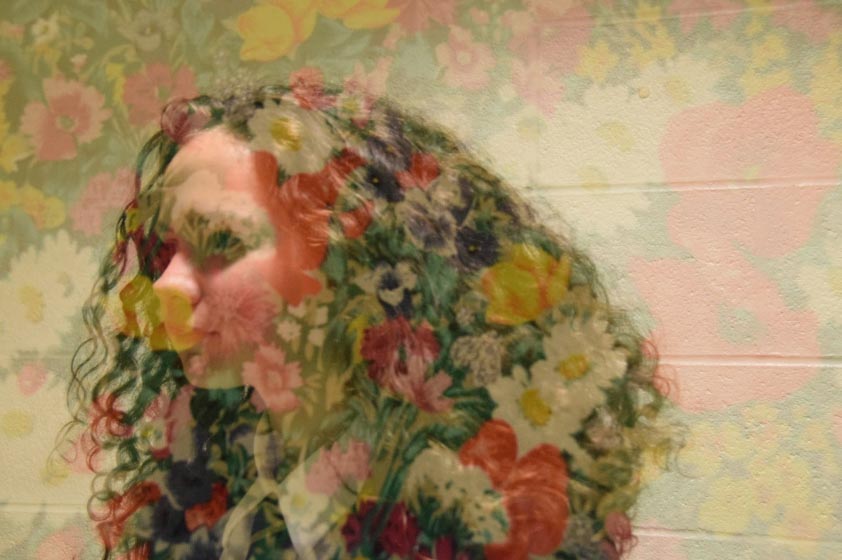 Girl's head with leaves.