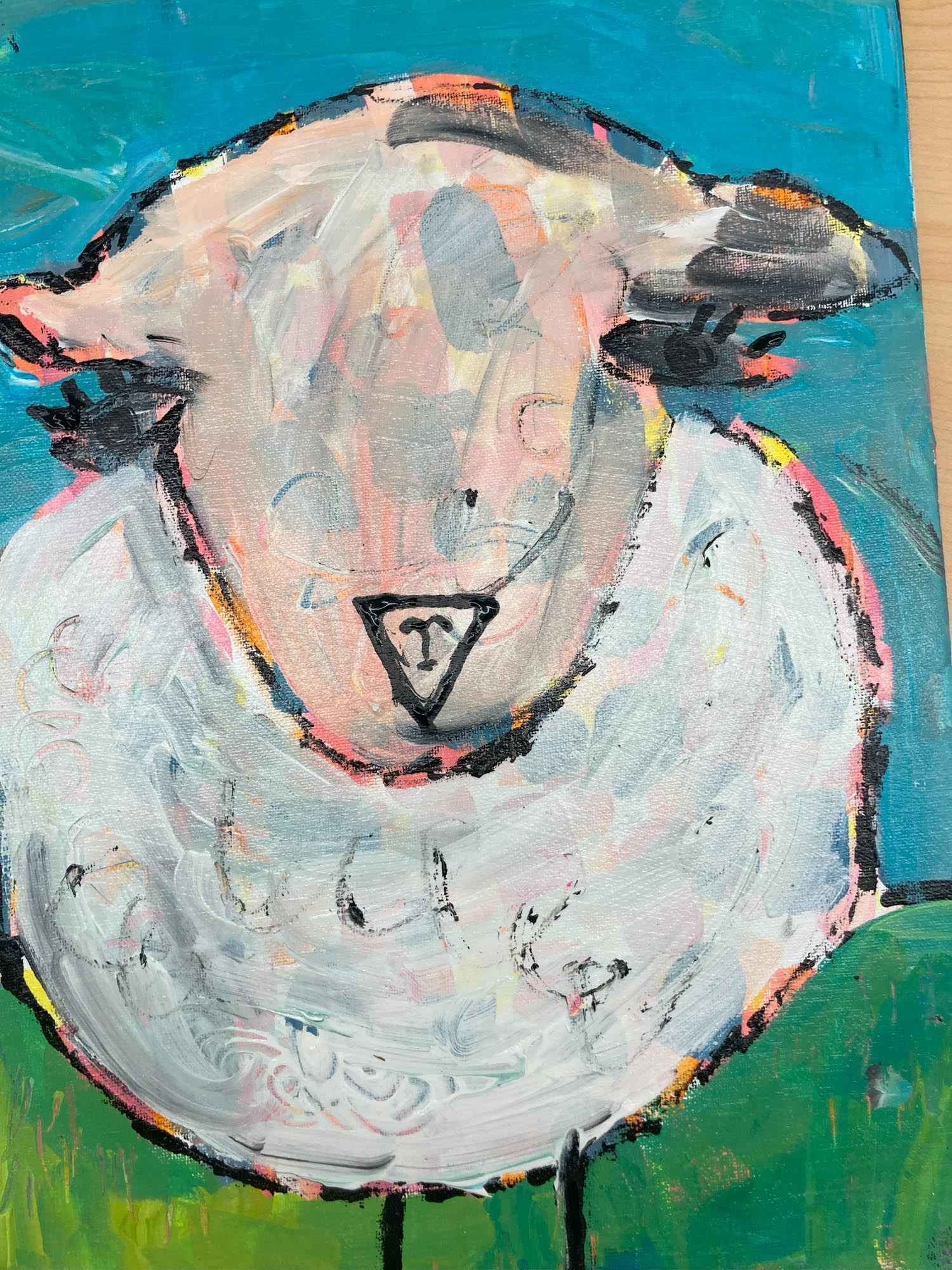Painting of a sheep.