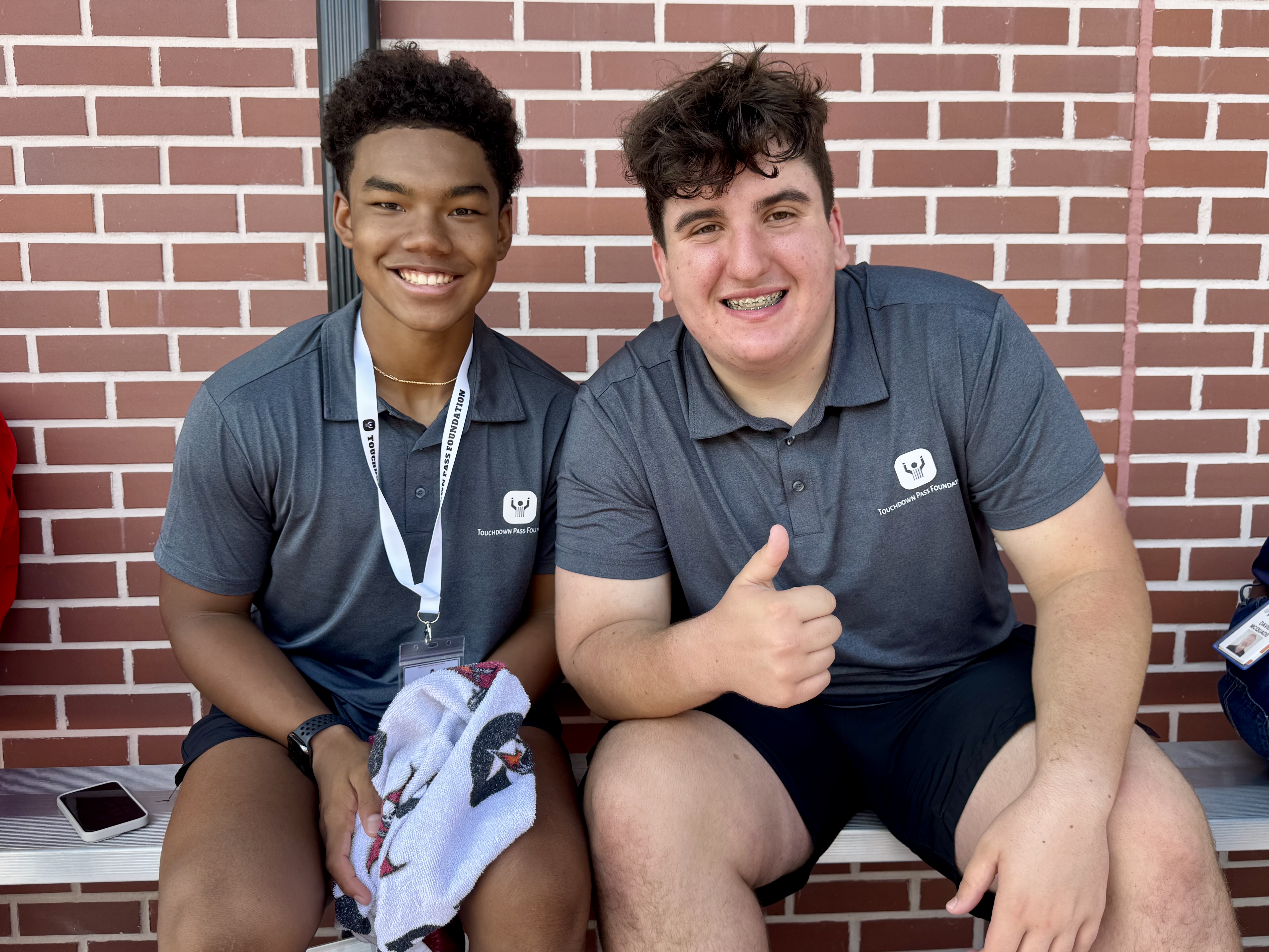 Touchdown Pass Foundation distributing football equipment to Tampa Bay youth athletes