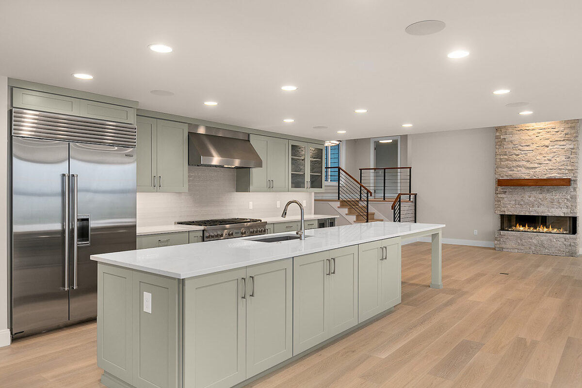 Edmonds Custom Home Renovation — open-concept chef's kitchen with Thermador and Sub-Zero appliances