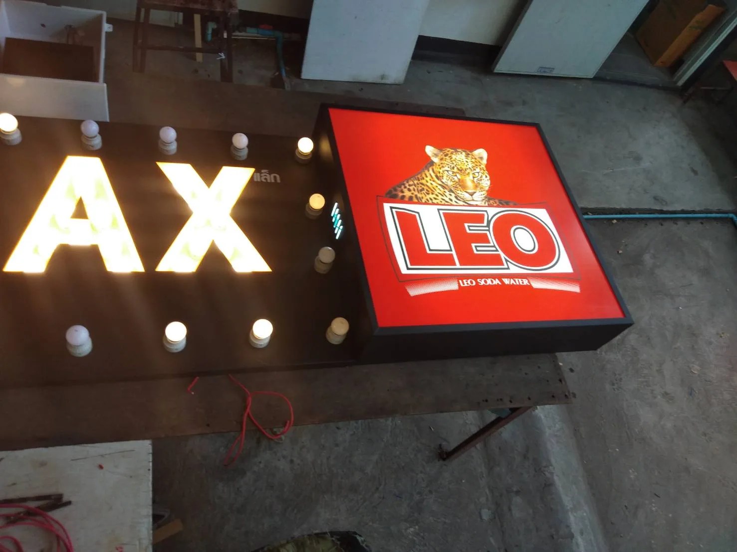 Chillax and Leo bulb signs - sign by Thai Prasith Signtech