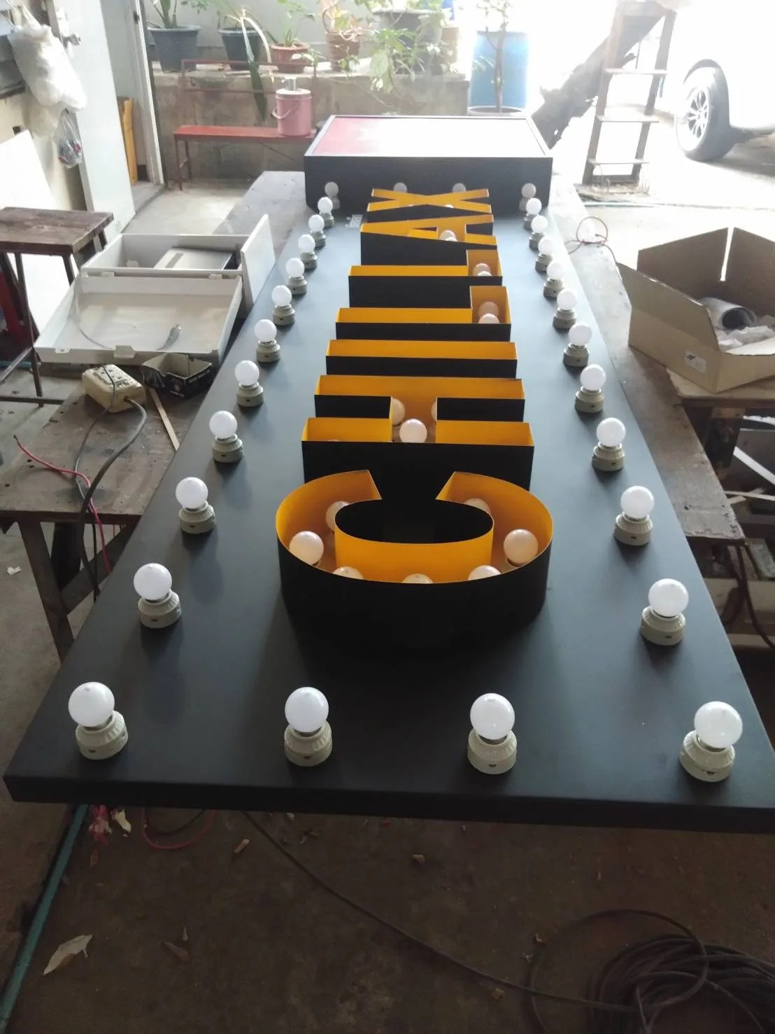 Chillax and Leo bulb signs - sign by Thai Prasith Signtech