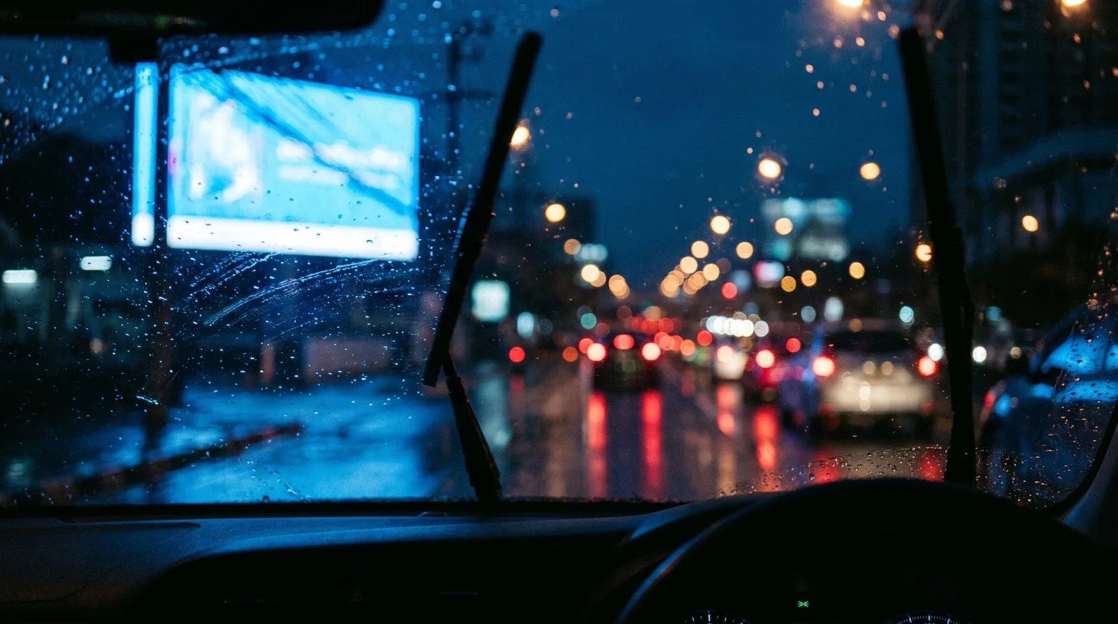 Driver point of view of roadside signage at night