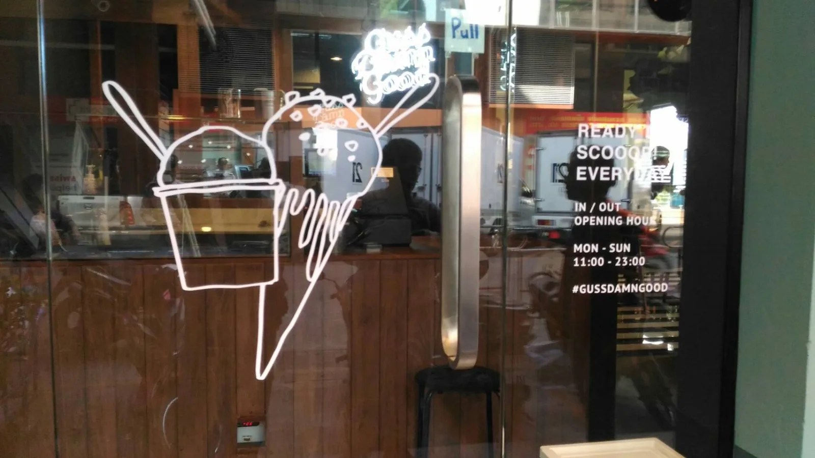 Guss Damn Good window graphics - sign by Thai Prasith Signtech
