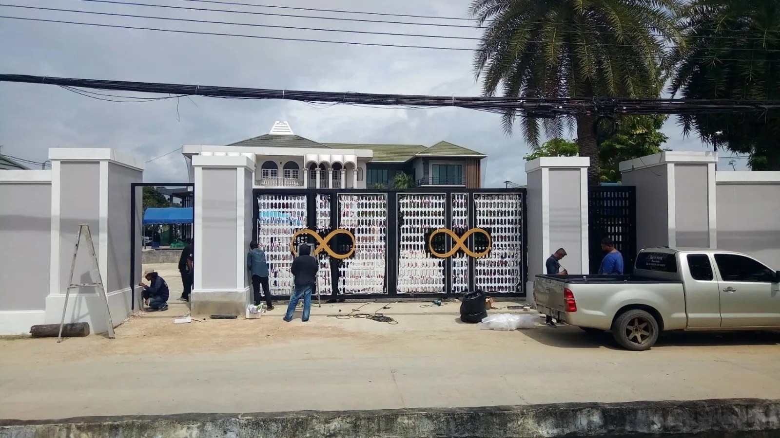 Perforated steel gates - sign by Thai Prasith Signtech