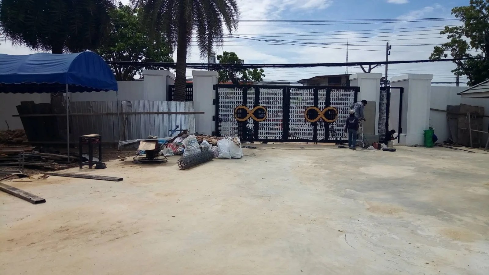 Perforated steel gates - sign by Thai Prasith Signtech