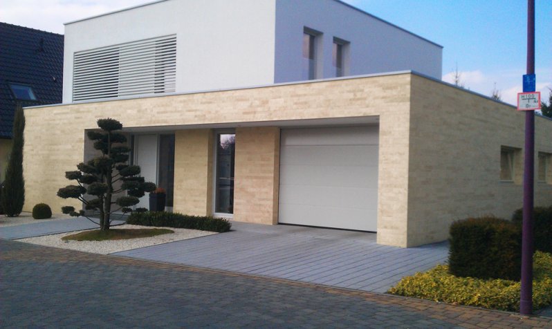 Gastherme verkleiden wie boiler verkleiden? Stadtvilla mit Natursteinfassade
