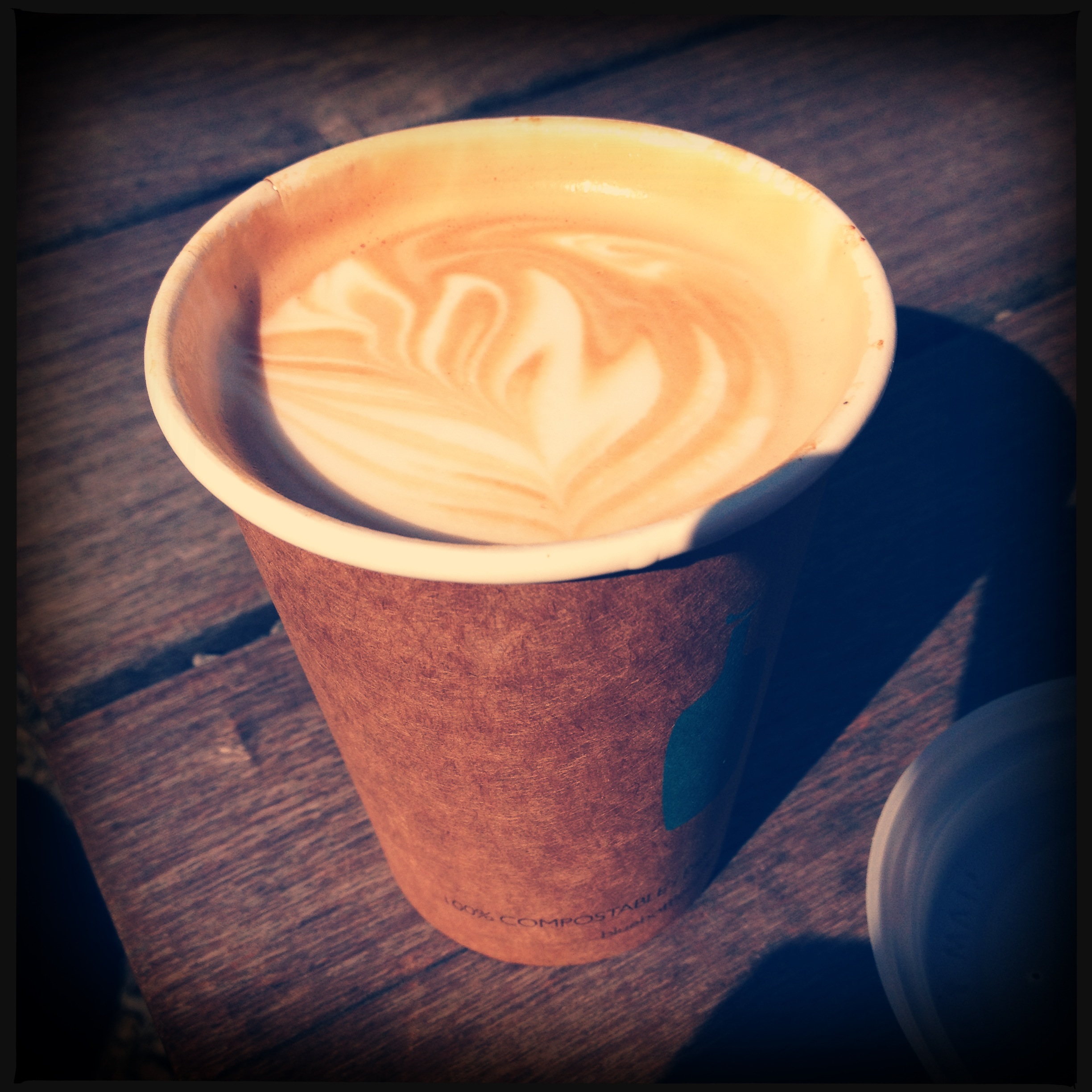 Enjoying a coffee roasted from Brooklyn's Blue Bottle. There's a booth on the park above the Chelsea Market.