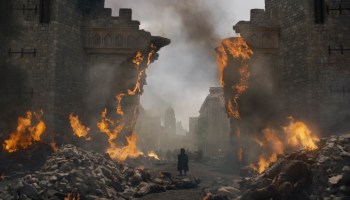 Tyrion Lannister (Peter Dinklage) watches as King's Landing is attacked in "The Bells", the penultimate episode of HBO's Game of Thrones (Courtesy of HBO)
