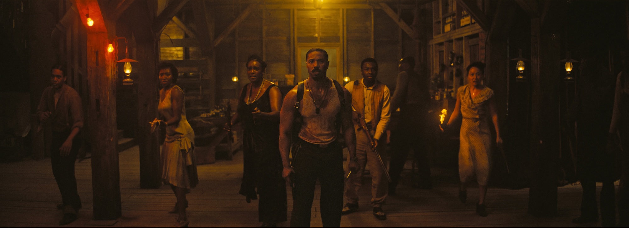 (L-r) JAYME LAWSON as Pearline, WUNMI MOSAKU as Annie, MICHAEL B. JORDAN as Smoke, MILES CATON as Sammie Moore, and LI JUN LI as Grace Chow, in Warner Bros. Pictures’ “SINNERS,” a Warner Bros. Pictures release.