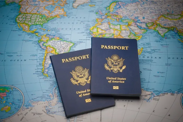 2 passports on a world map