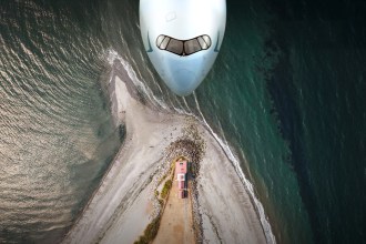 Cathay Pacific aircraft over a coast
