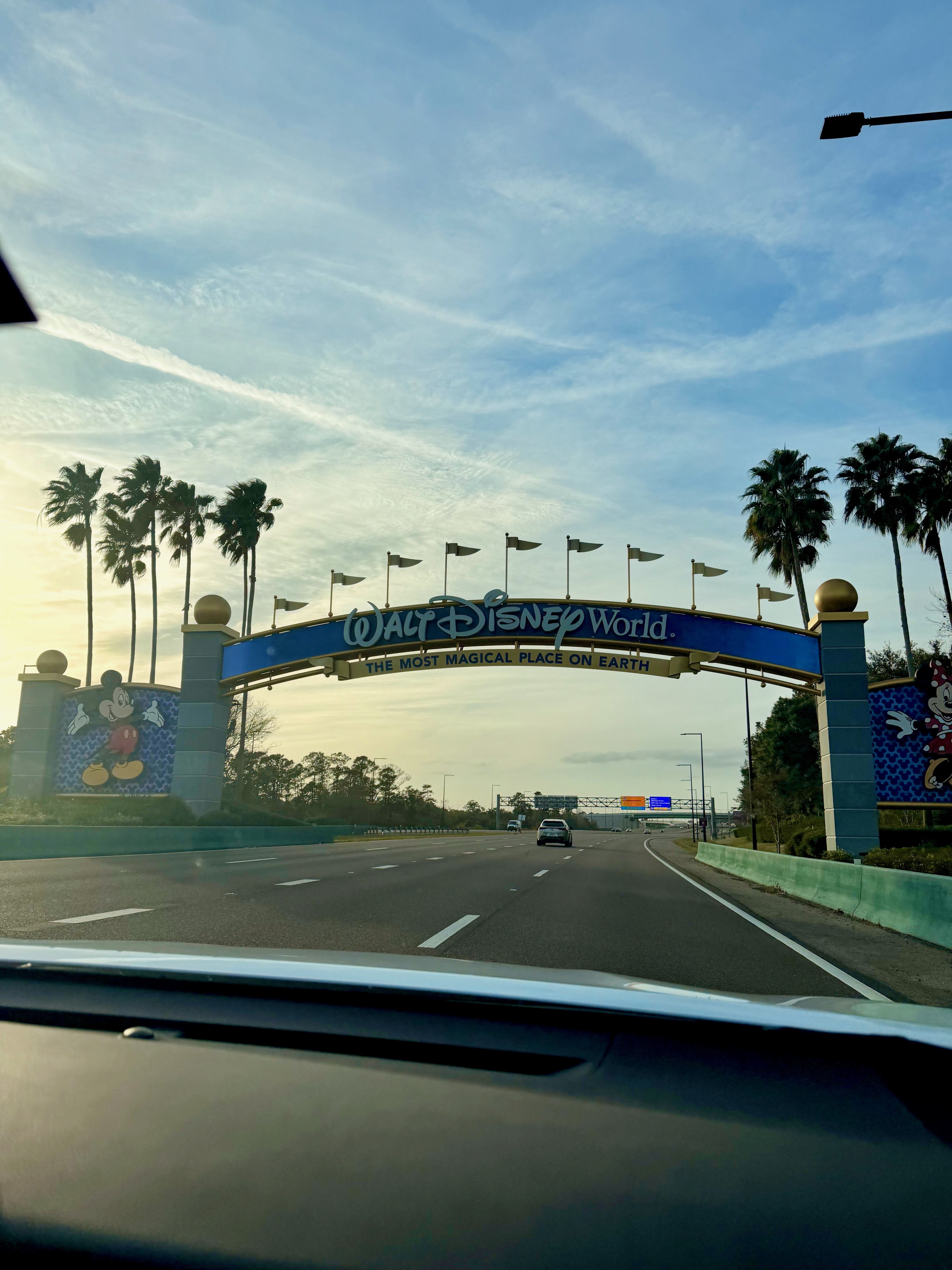 The Walt Disney World entrance arch on the drive into the resort