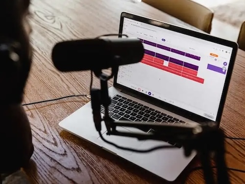 Podcast using an Apple laptop