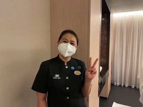 Spa worker with a mask