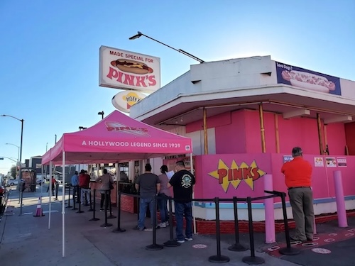 Customers in line at Pink's hot dogs