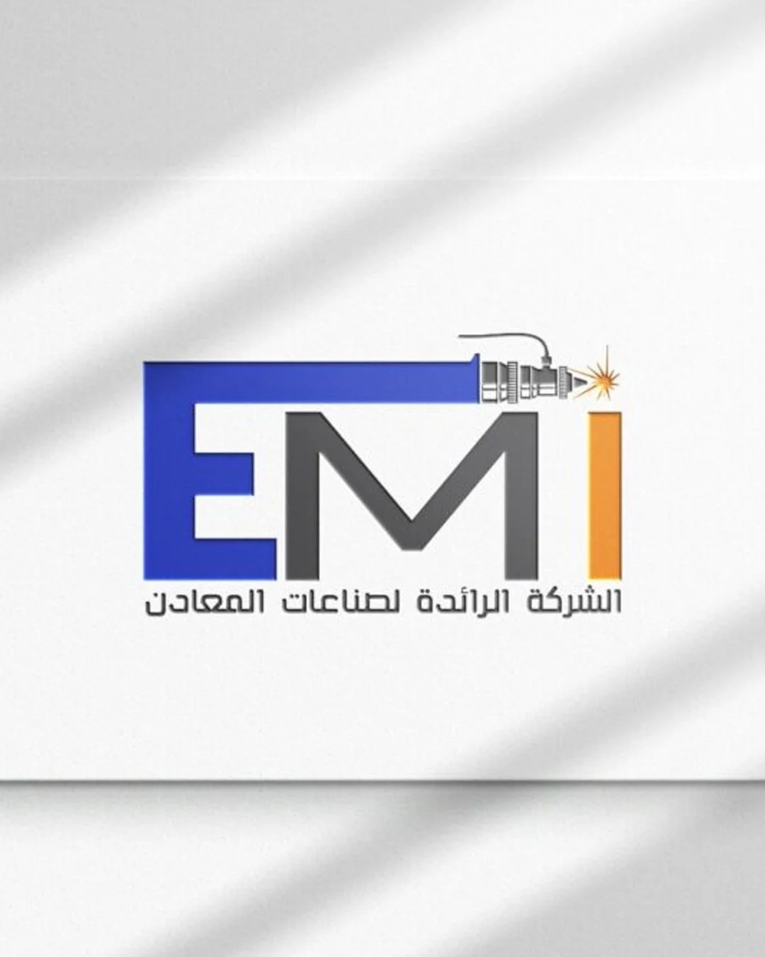 The logo is designed to reflect strength, precision, and industrial expertise. The bold letterforms create a solid and structured visual presence, representing reliability and professionalism in the field of metal industries. The integration of sharp edges and clean lines emphasizes accuracy and technical performance, while the color combination balances trust and energy — blue representing stability and confidence, and orange symbolizing power and productivity. The welding element incorporated into the design adds a distinctive touch, directly linking the brand to its core activity and reinforcing its identity within the industrial sector.