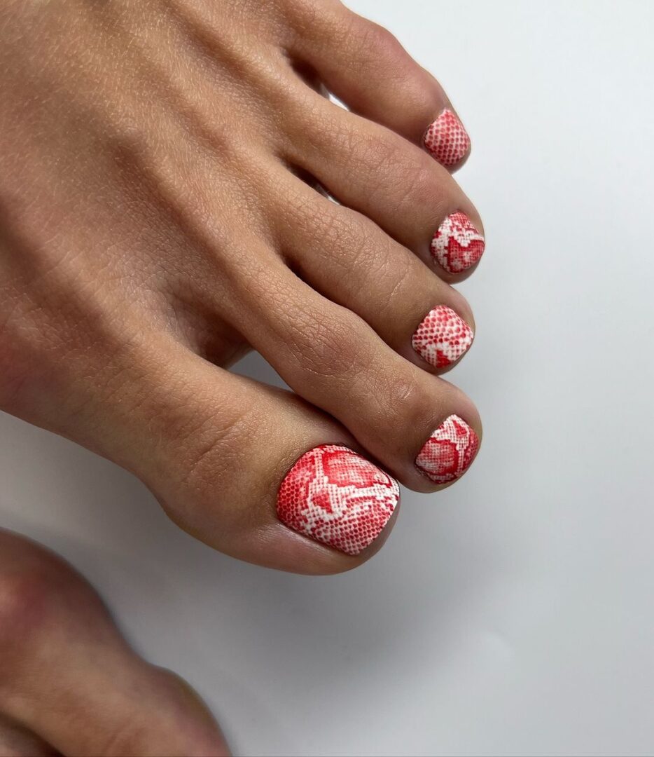 Toe-mendeous red toe nails that make your eyes pop