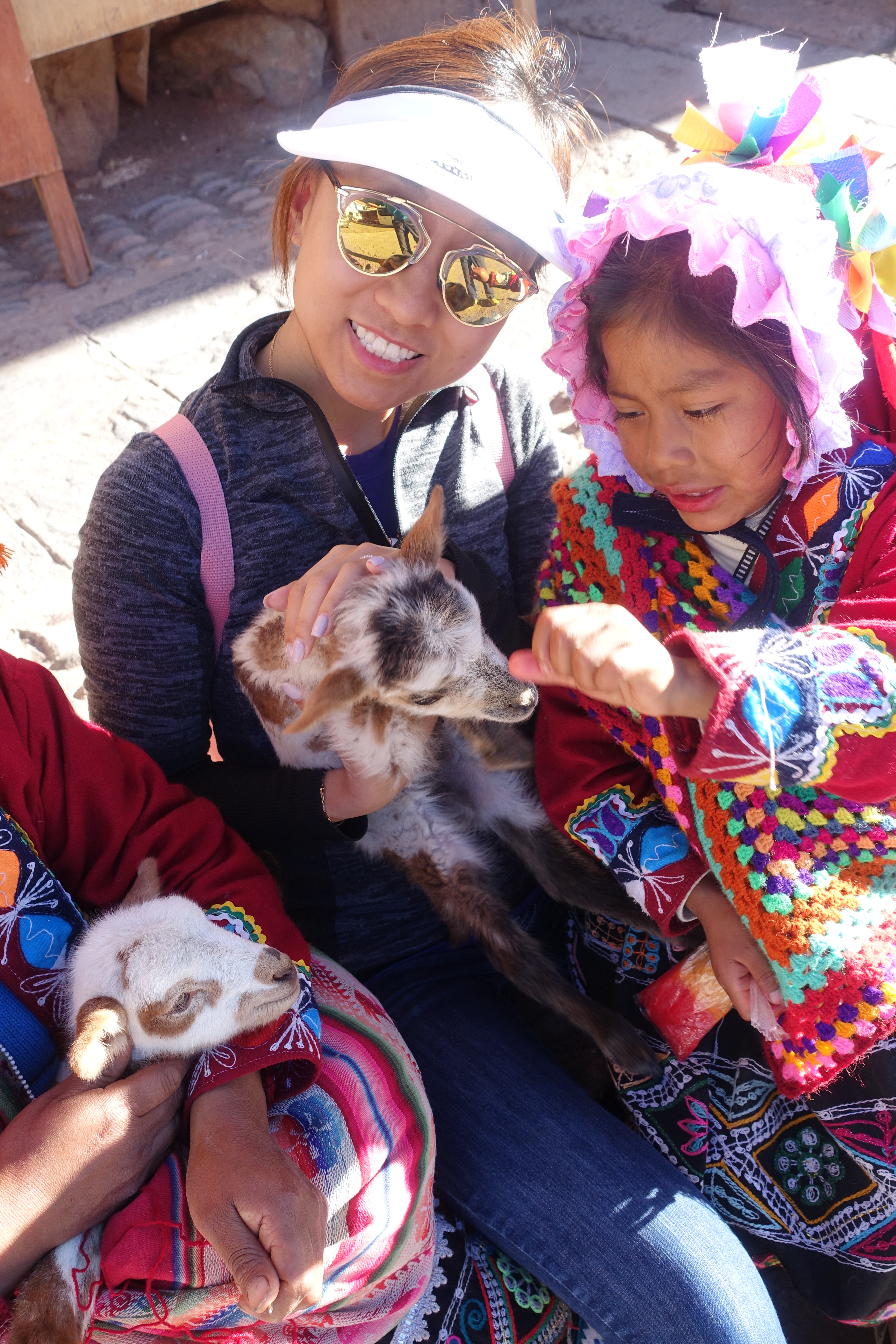 Local girls with their pet goats