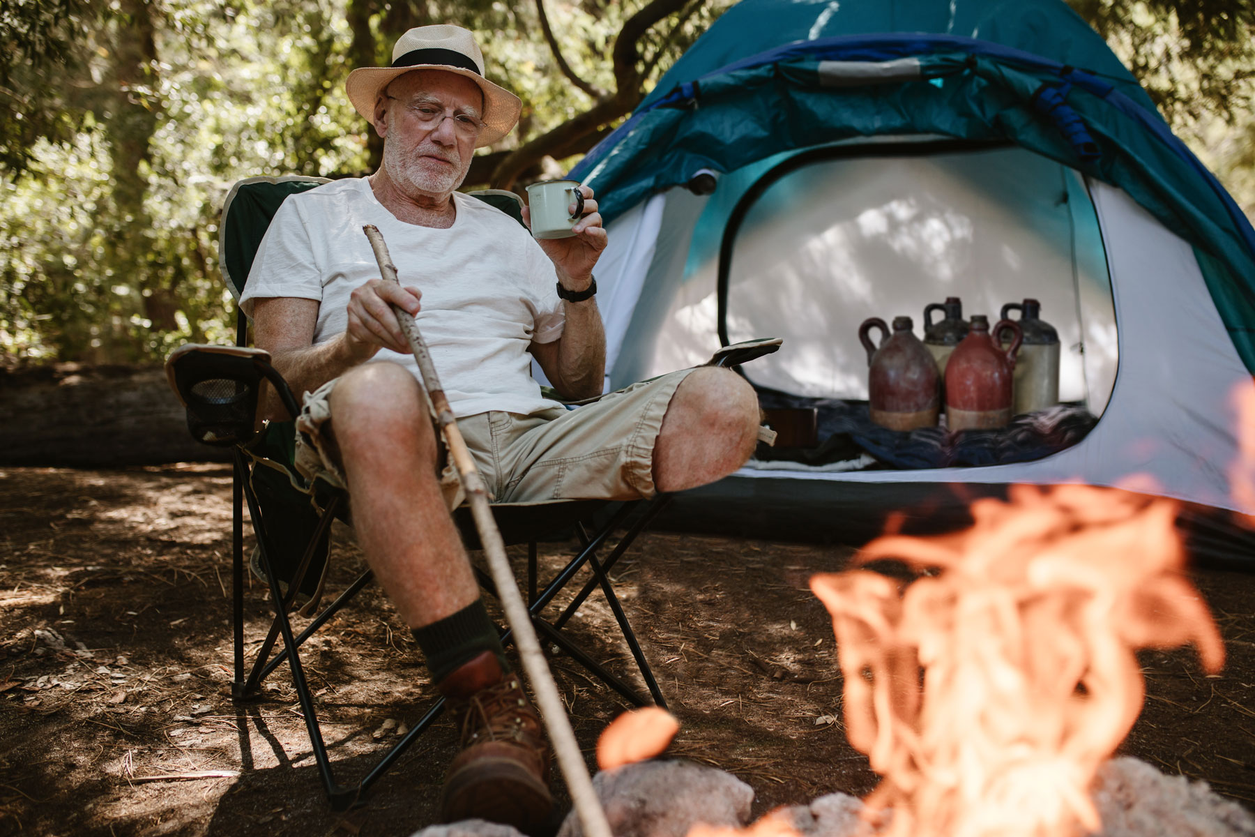 One legged Colorado bootlegger by his fire
