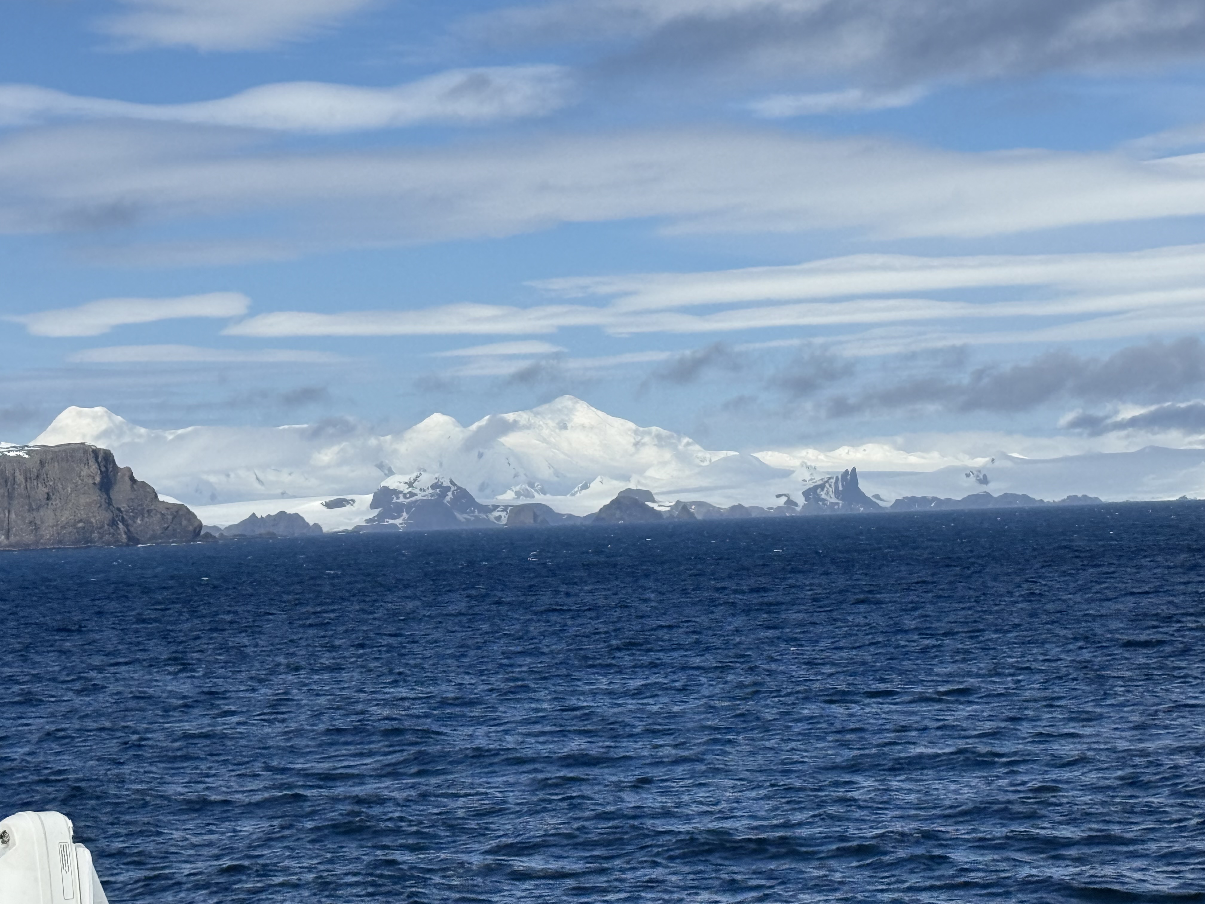 Snow-covered Antarctic mountains seen from the expedition ship