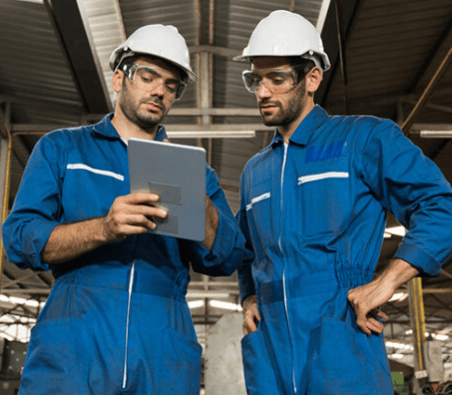Reliability Engineers discussing the Living Playbook