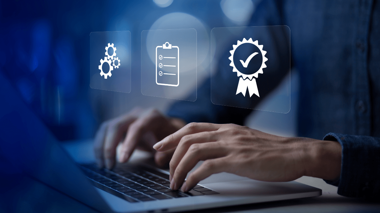 Person typing on a laptop with three floating icons: gears, a checklist, and a certification ribbon.