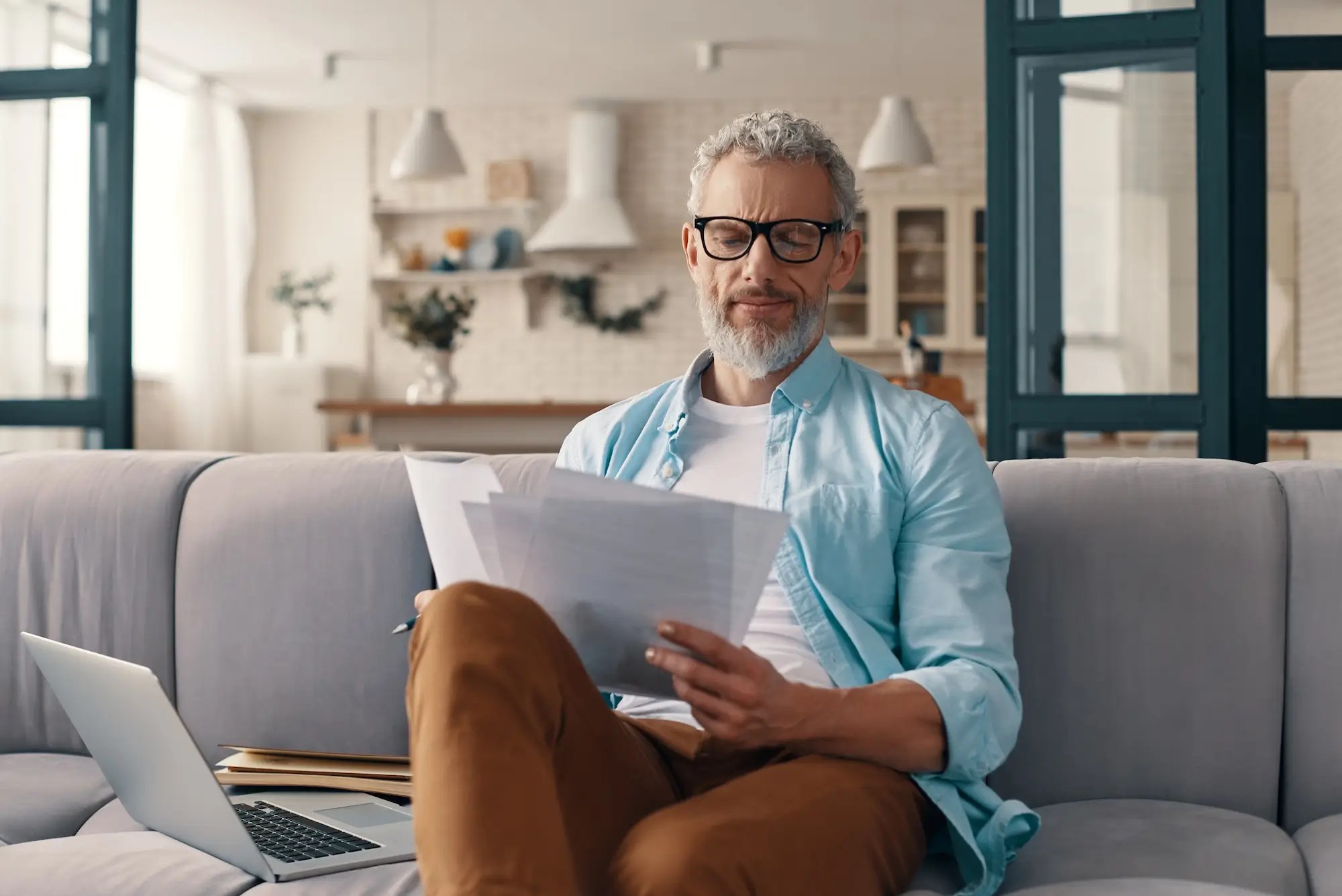 Man reading his results at home