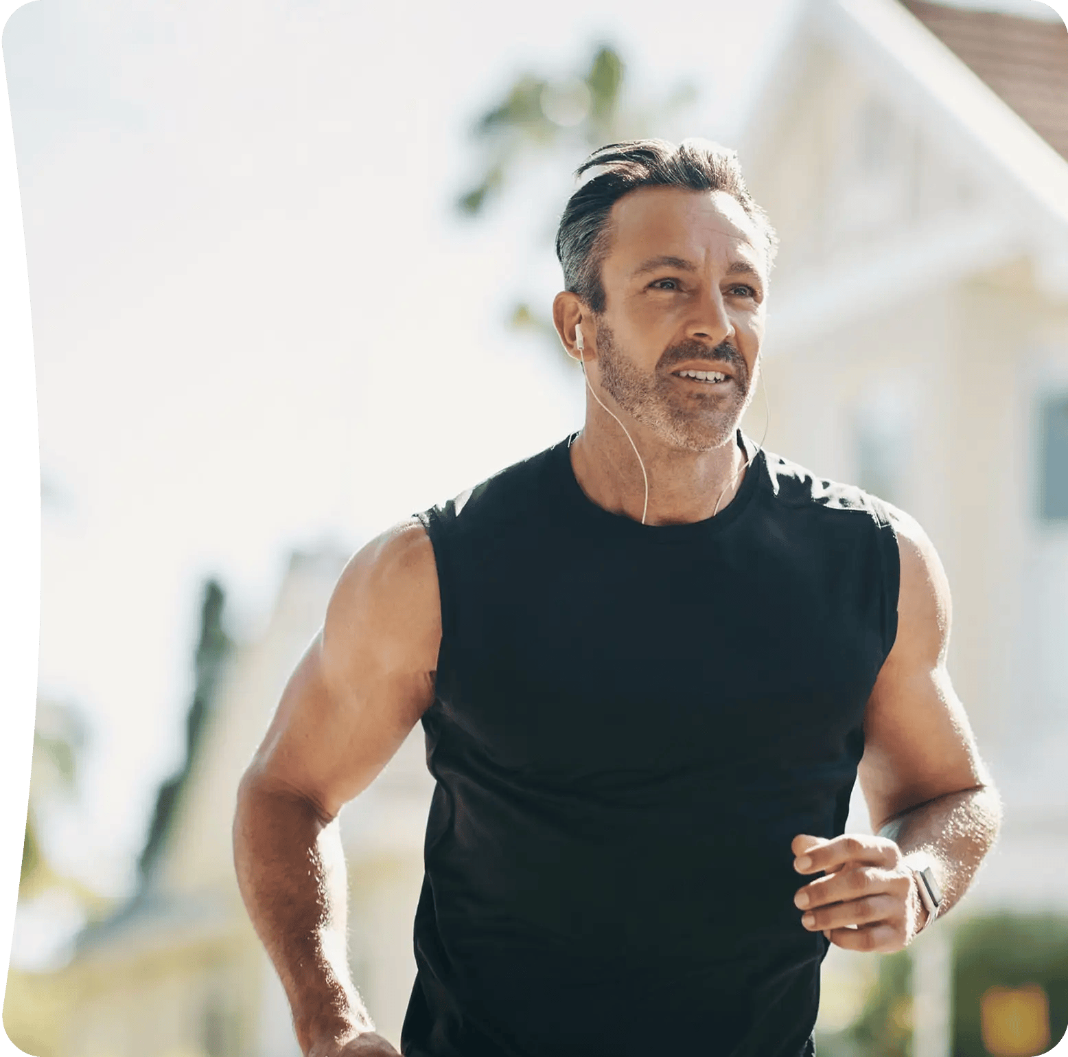 Fit man running outdoors