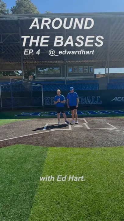 Duke baseball players with Ed Hart at home plate