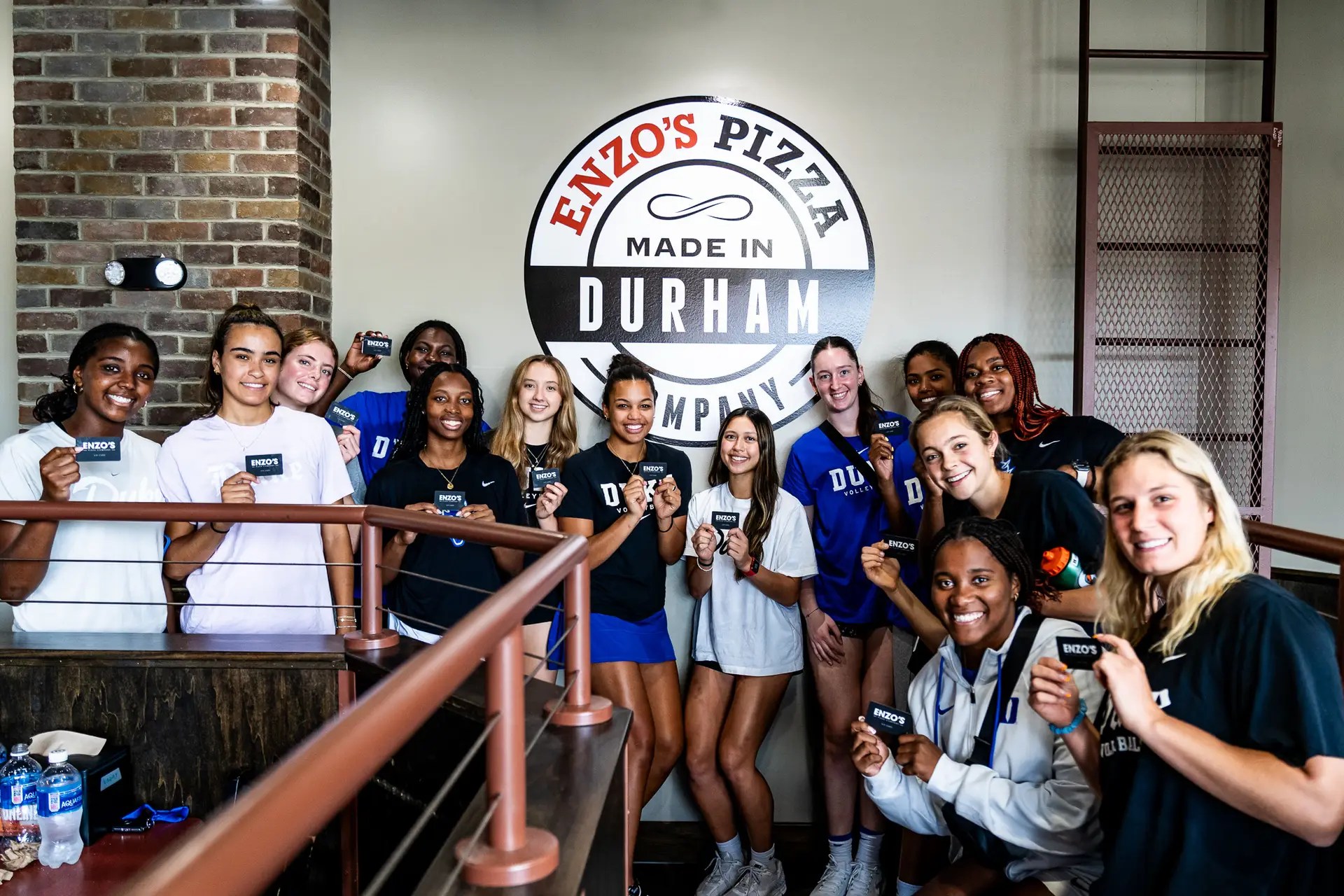 Duke athletes at Enzo's Pizza team event in Durham