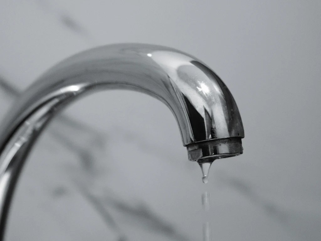 Dripping faucet needing 24 hour plumber near me for urgent leak repair