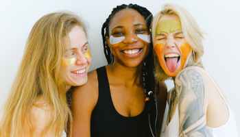 photo of women doing their skincare