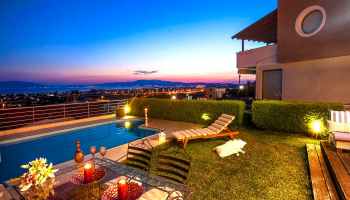 modern styled house with overviewing swimming pool