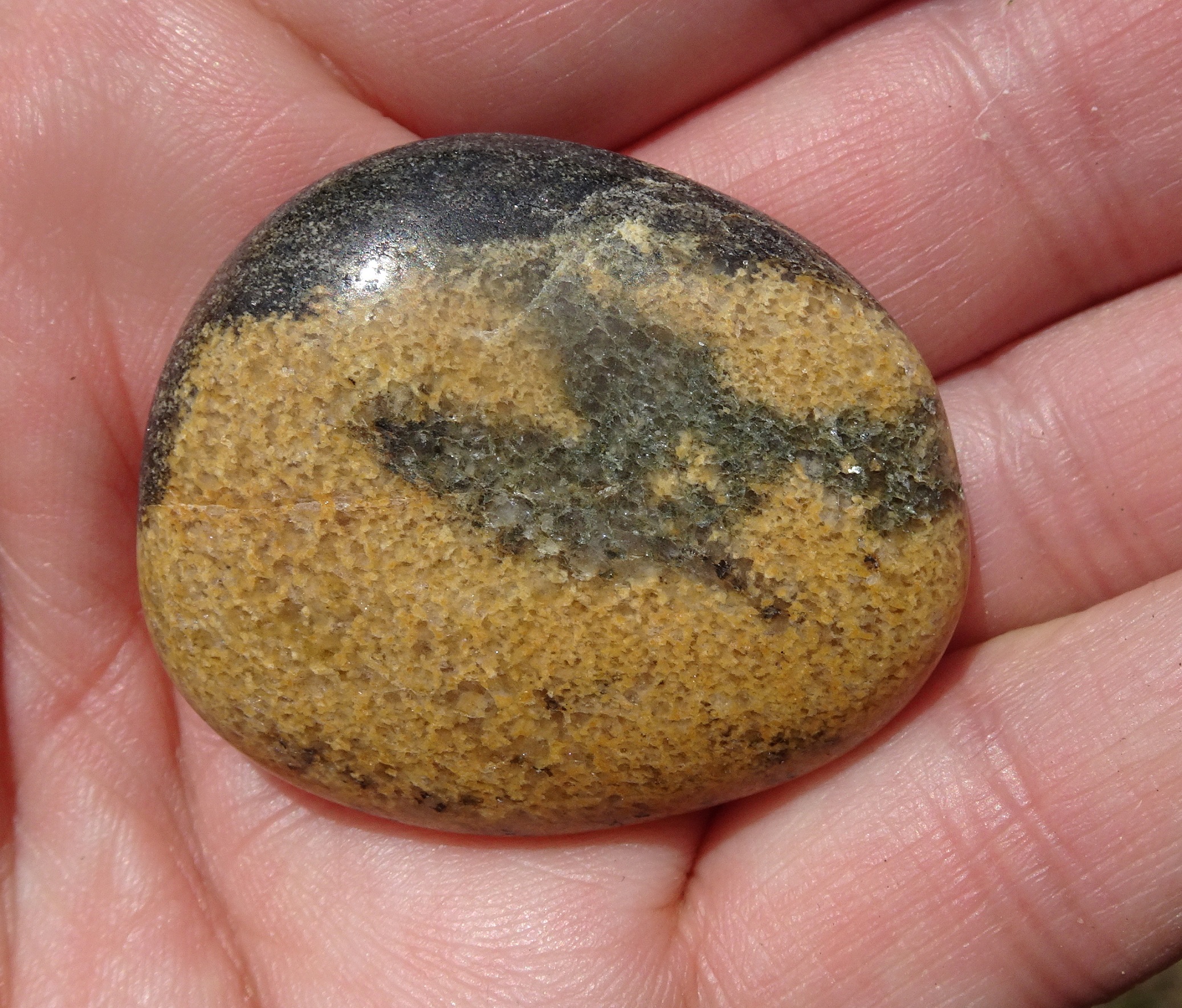Iron-stained quartz accounts for the orange in this stone.