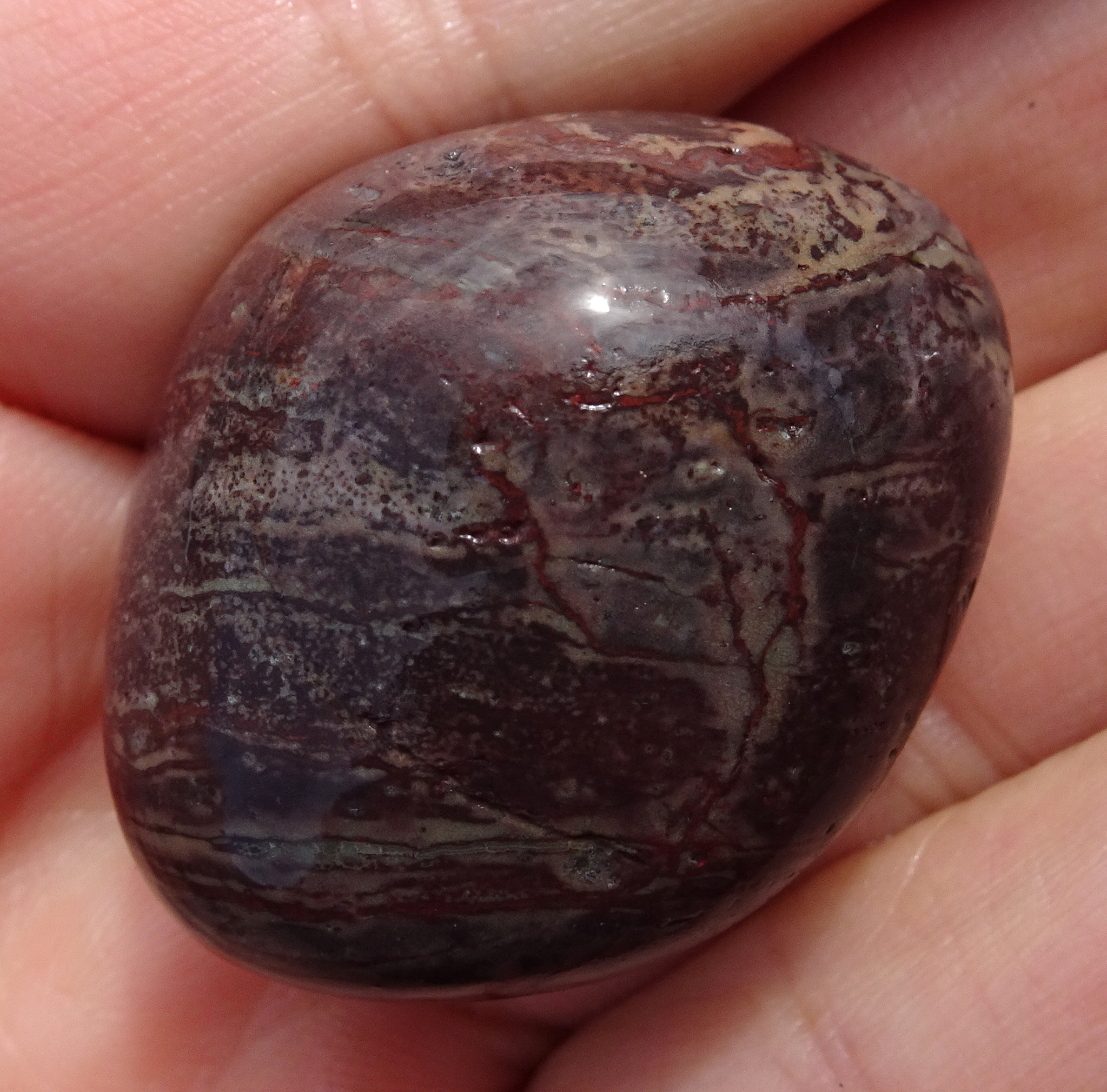 Small purple stone.