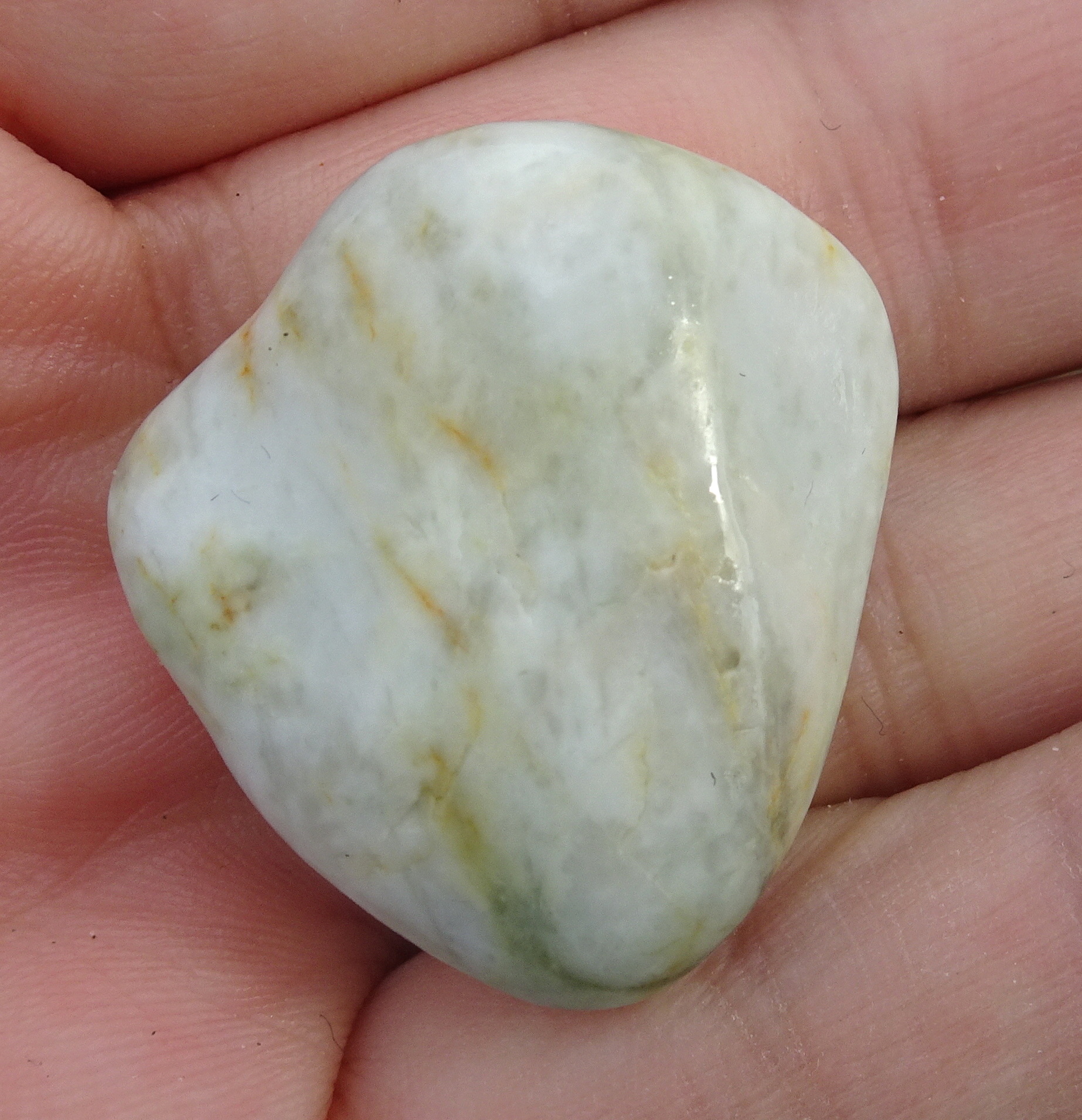 This is a small white hydrogrossular garnet. Not usually found this far east along the coast. I have been told of the rare one turning up here, and have found a couple of lower-quality ones in the past two years.