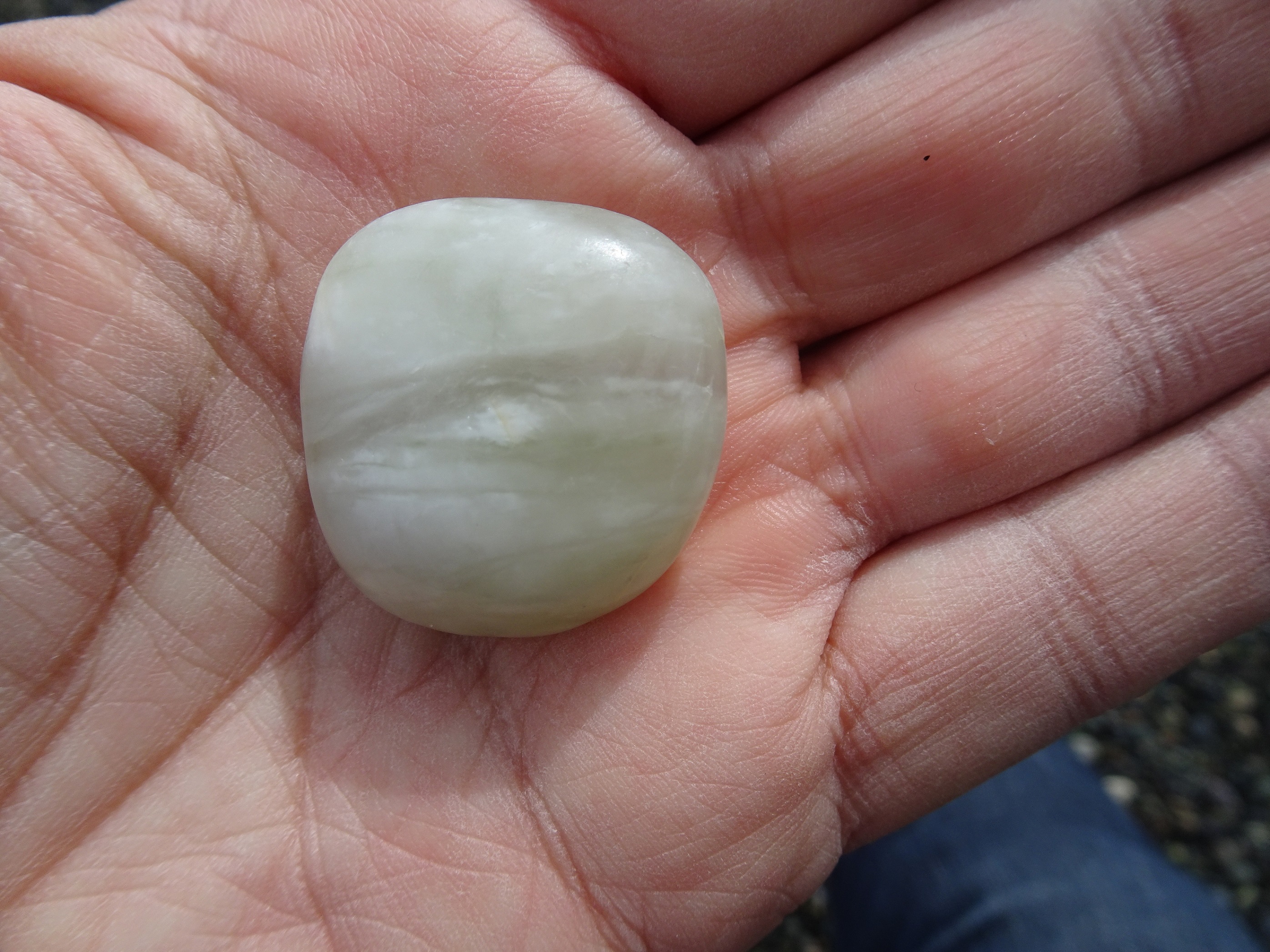 Small white hydrogrossular garnet.