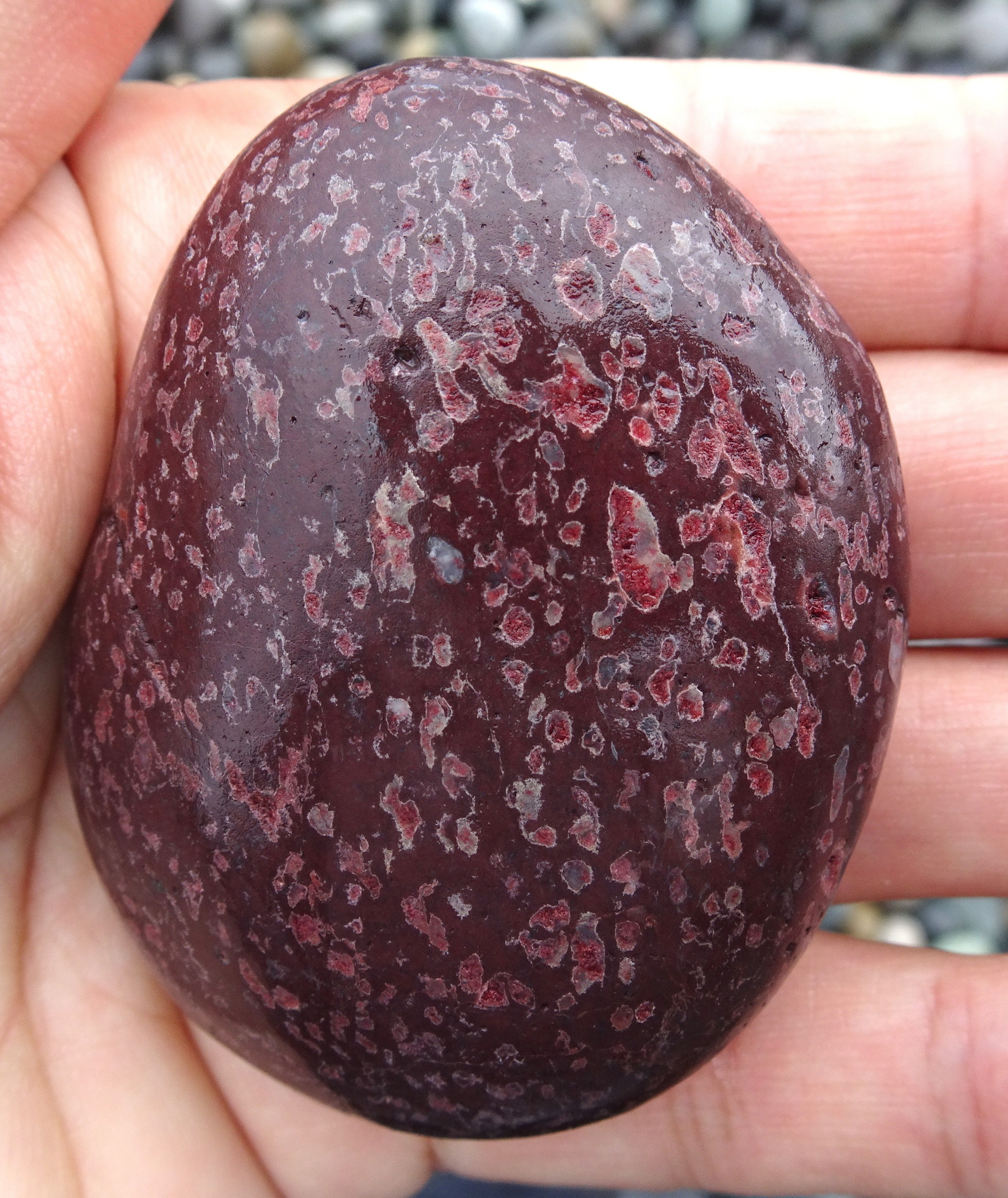 Another of those purple stones, with interesting inclusions.