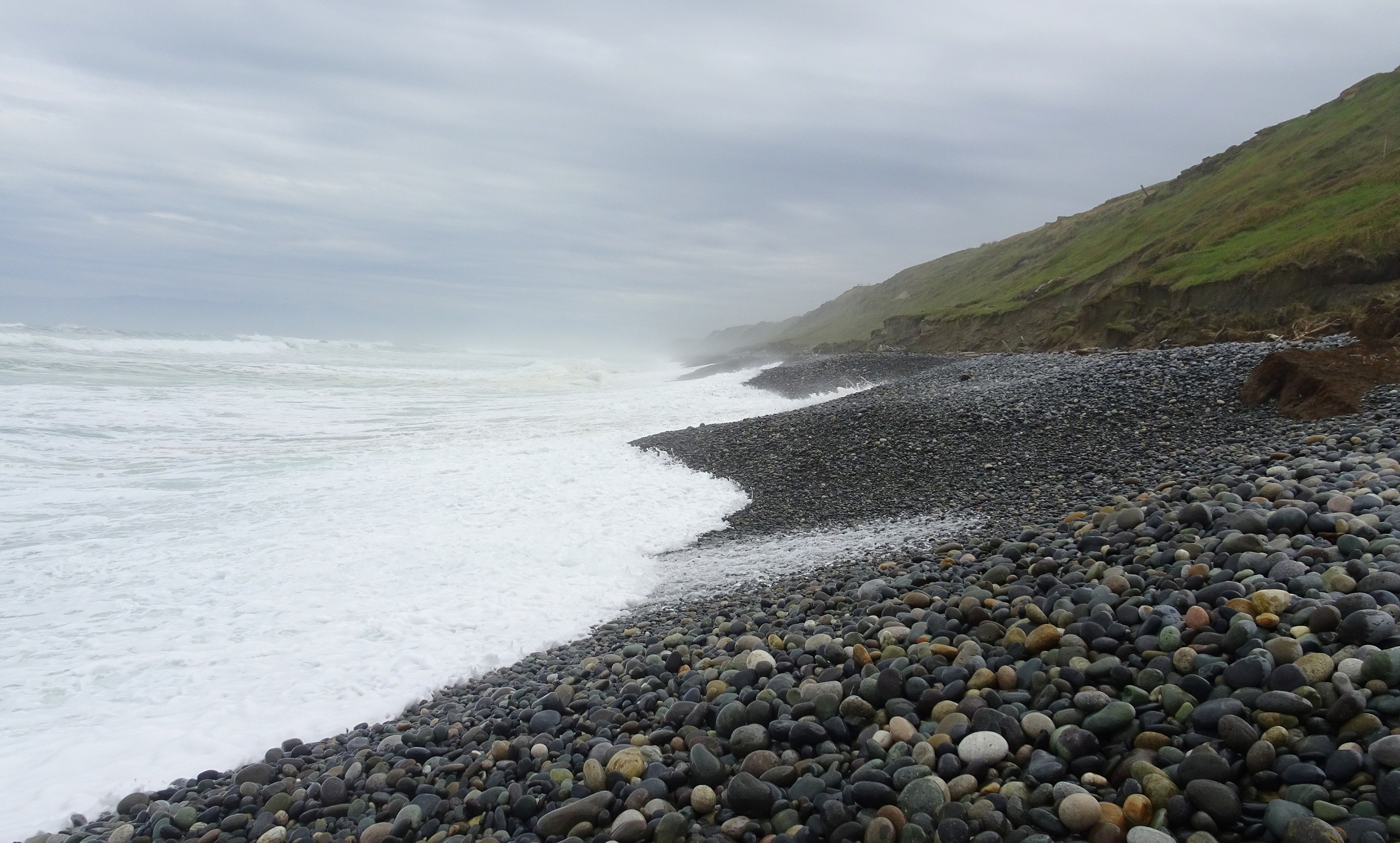 Later, Gemstone Beach with high powerful waves sprinting up the banks of stones. The beach near the car park is more benign though care is always required.
