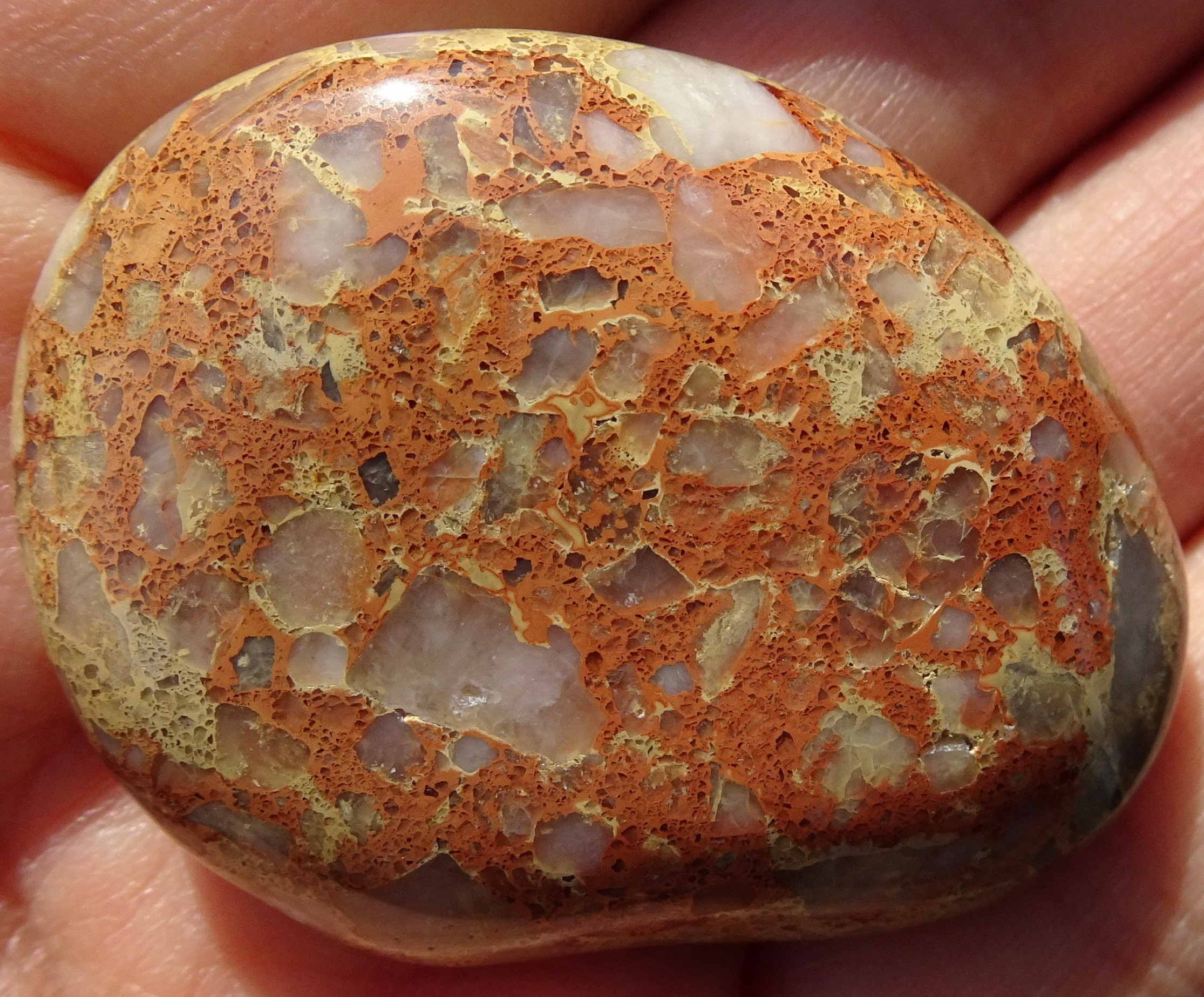 The reddish-brown side.
