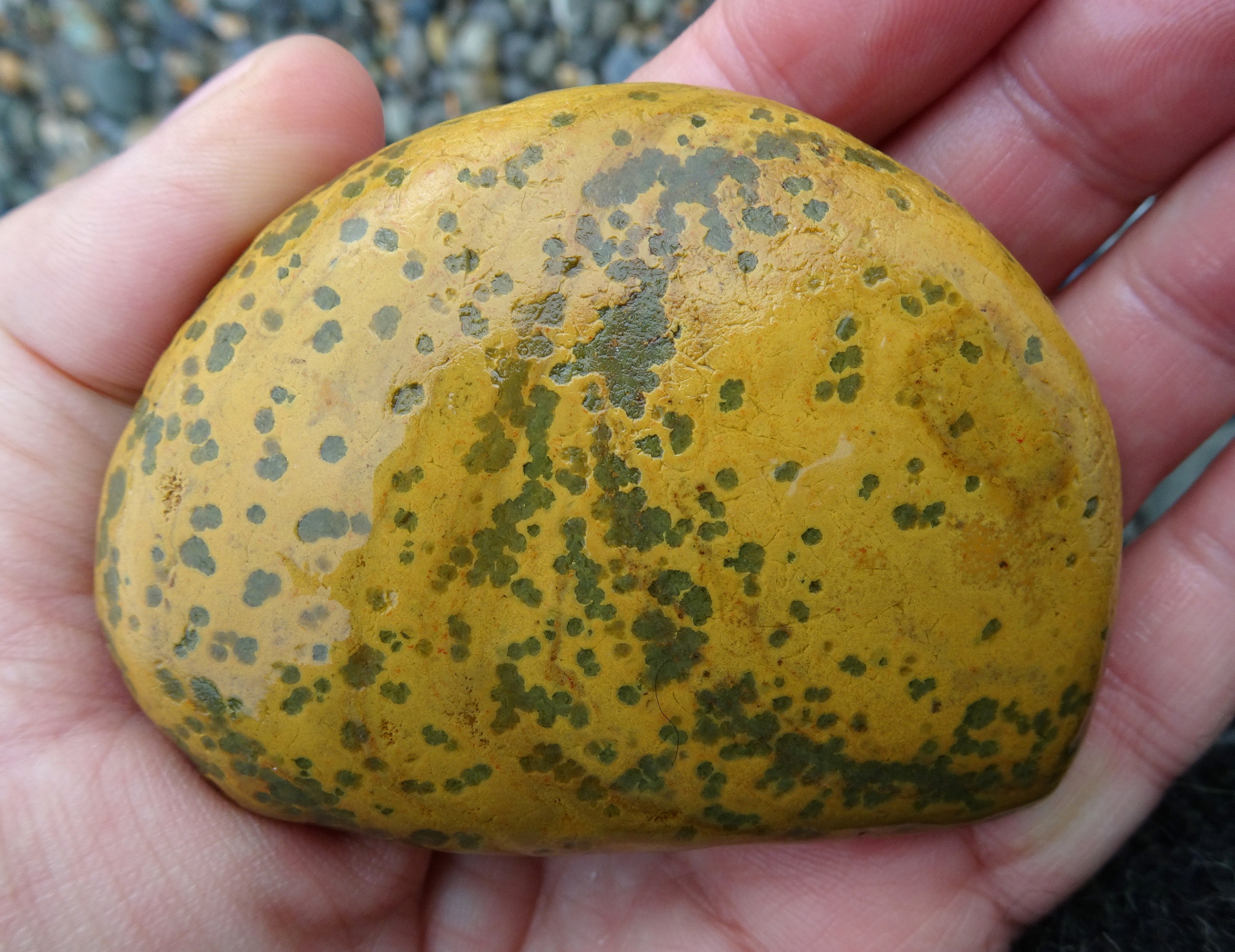 Bigger stone, with small circular features.