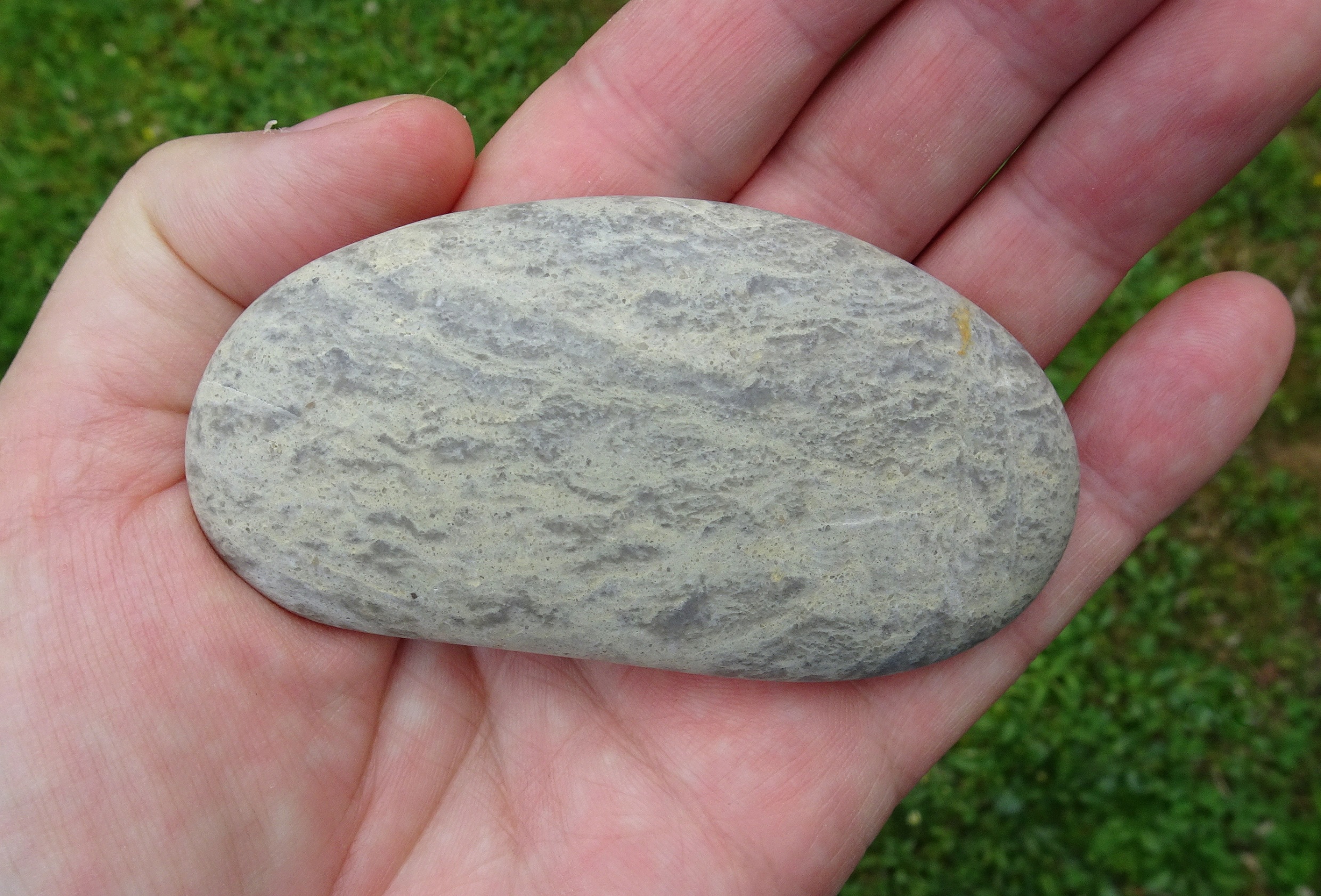 Neutral coloured Kakanui quartzite 9.5 cms long, just out of a 400 grit tumble in a 4lb barrel.