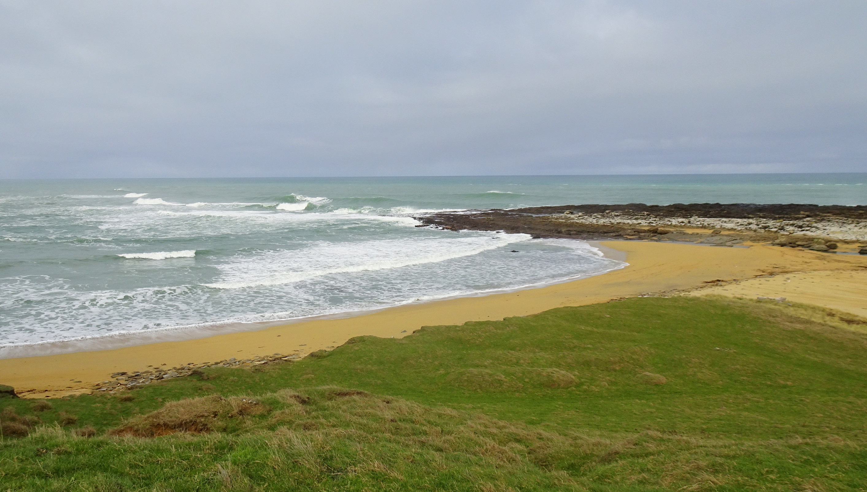 The beach at Slope Point today.