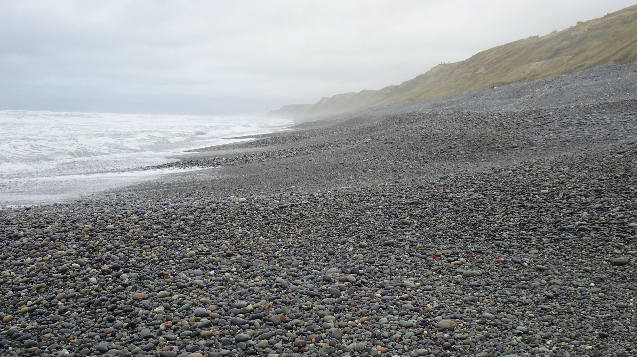 Beach stones west of the Waimeamea River mouth, Monday.