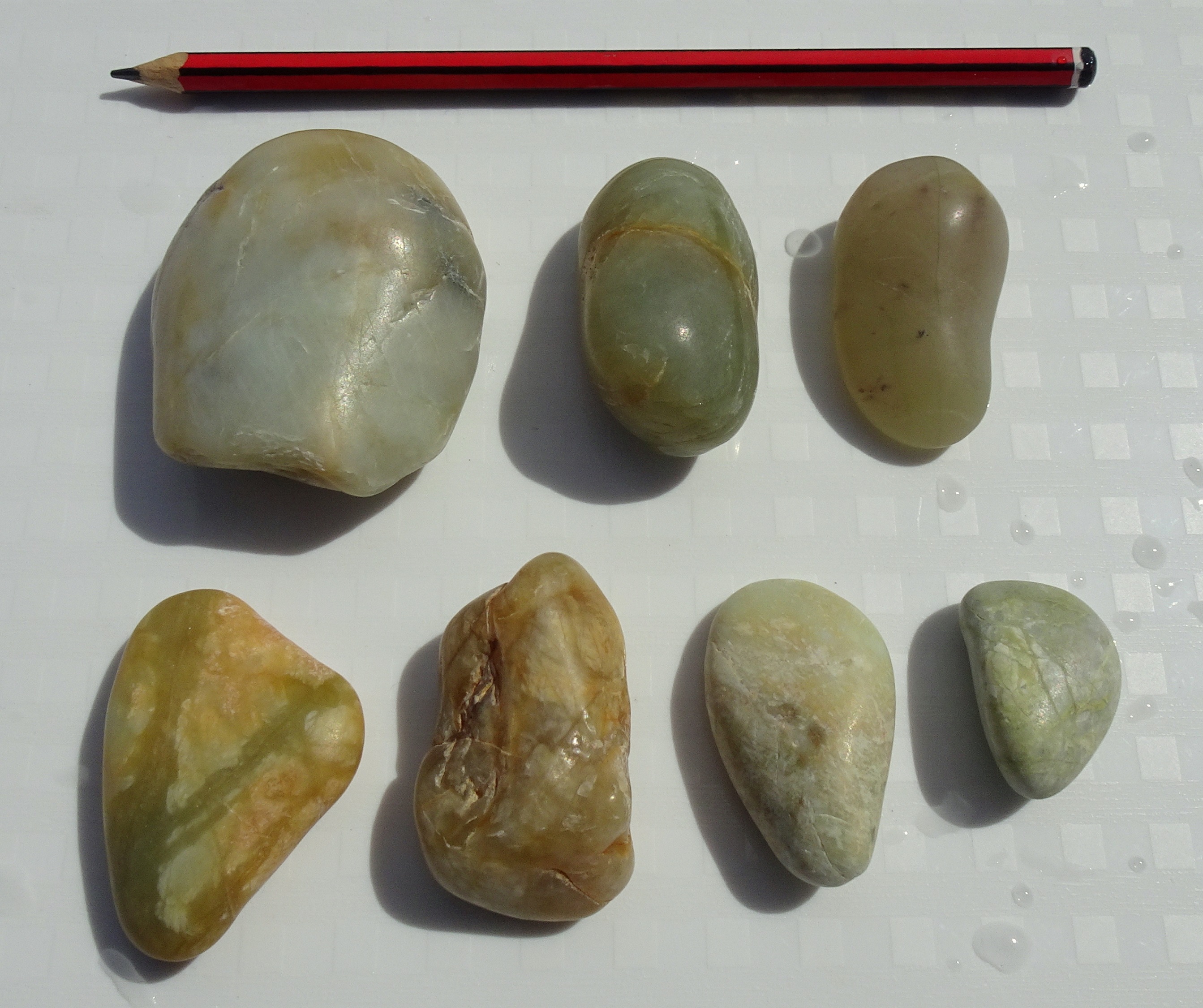 Seven of the hydrogrossular garnets I collected.