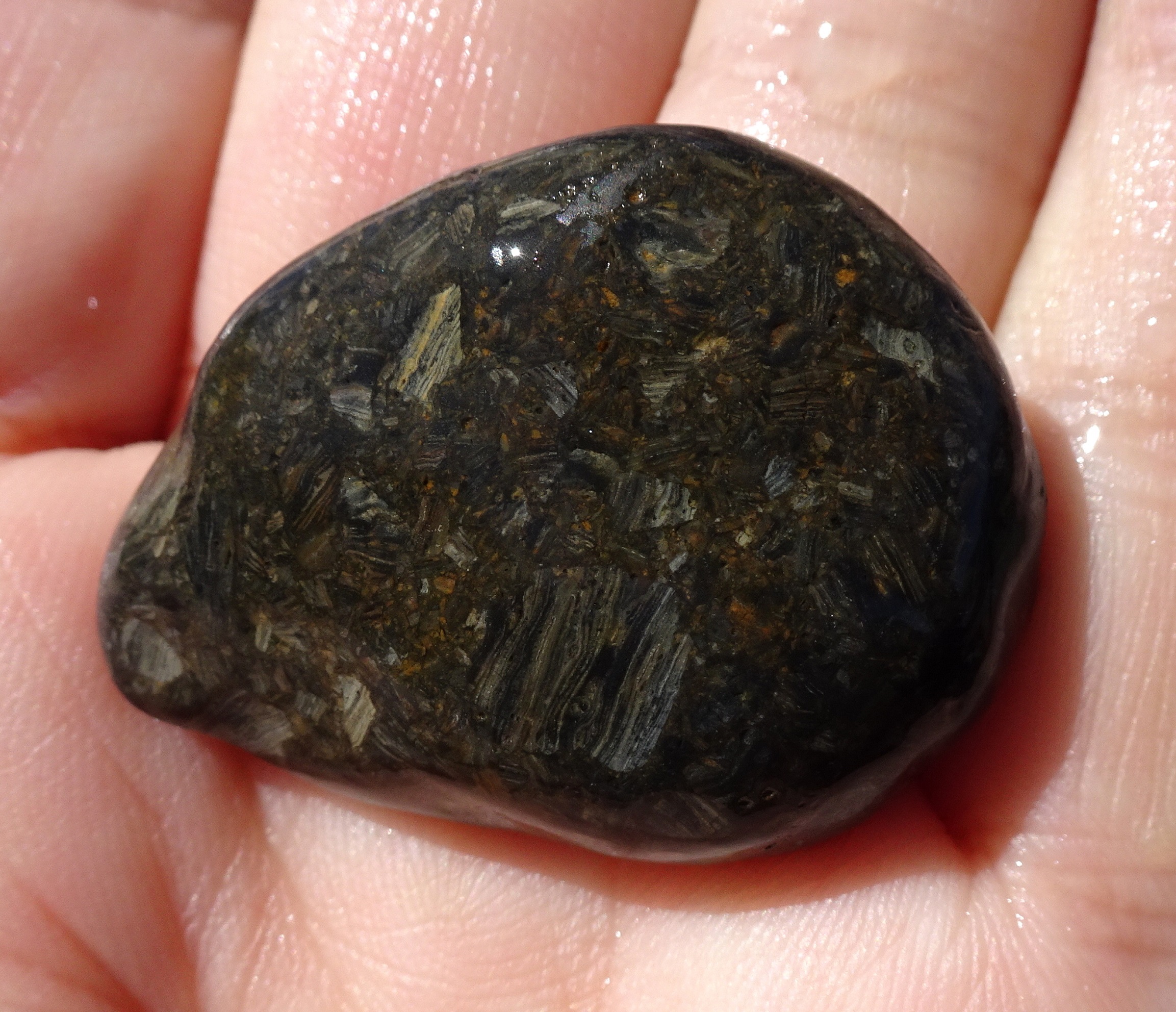 Very dark brecciated volcanic stone.